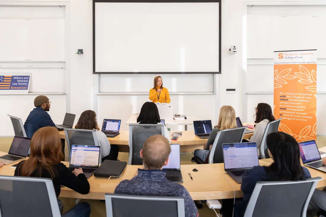 Navy veteran and Syracuse University Law student Laurie Coffey in a classroom.